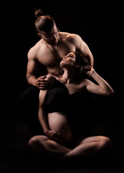 Intimate Maternity Portrait with Bodybuilder Partner
