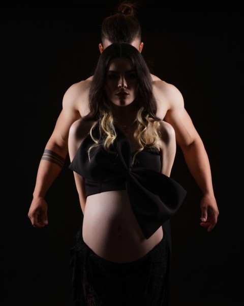 Powerful Backlit Maternity Portrait with Partner