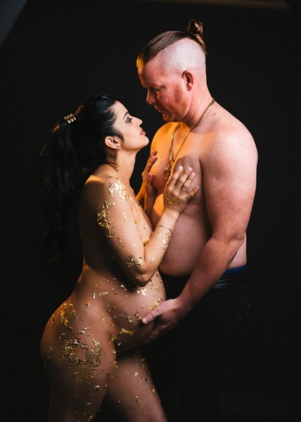Artistic maternity couple portrait with gold leaf
